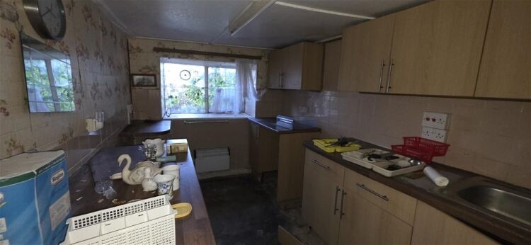 Auction Lot: Renovation-Ready 3-Bedroom Cottage plus Development Land For Sale in Newton Abbot