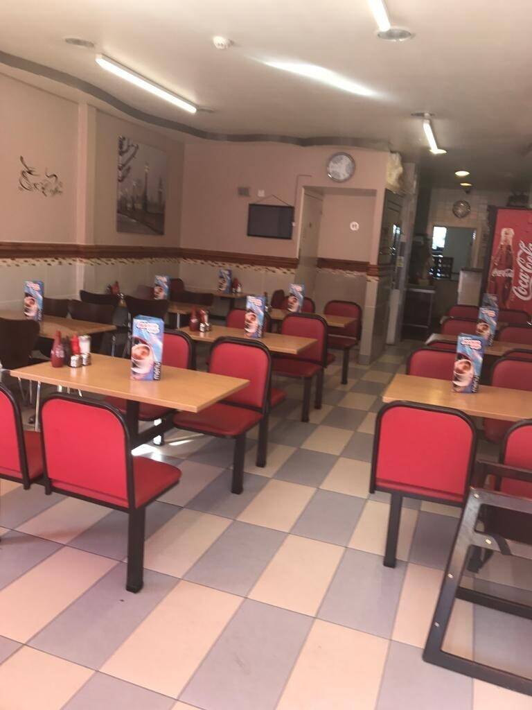 Busy cafe on high street with flat for sale leasehold