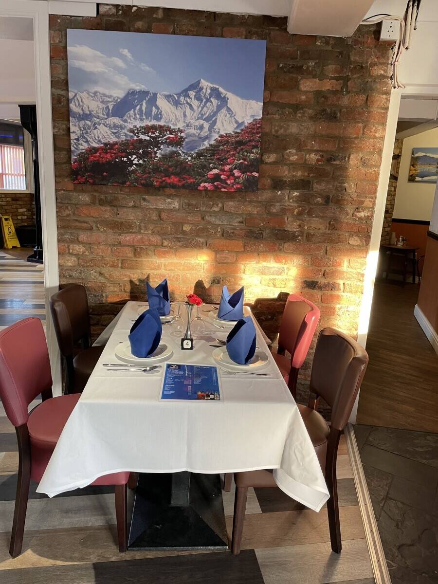 A leasehold Indian restaurant with sports bar on the basement and a party hall on first floor