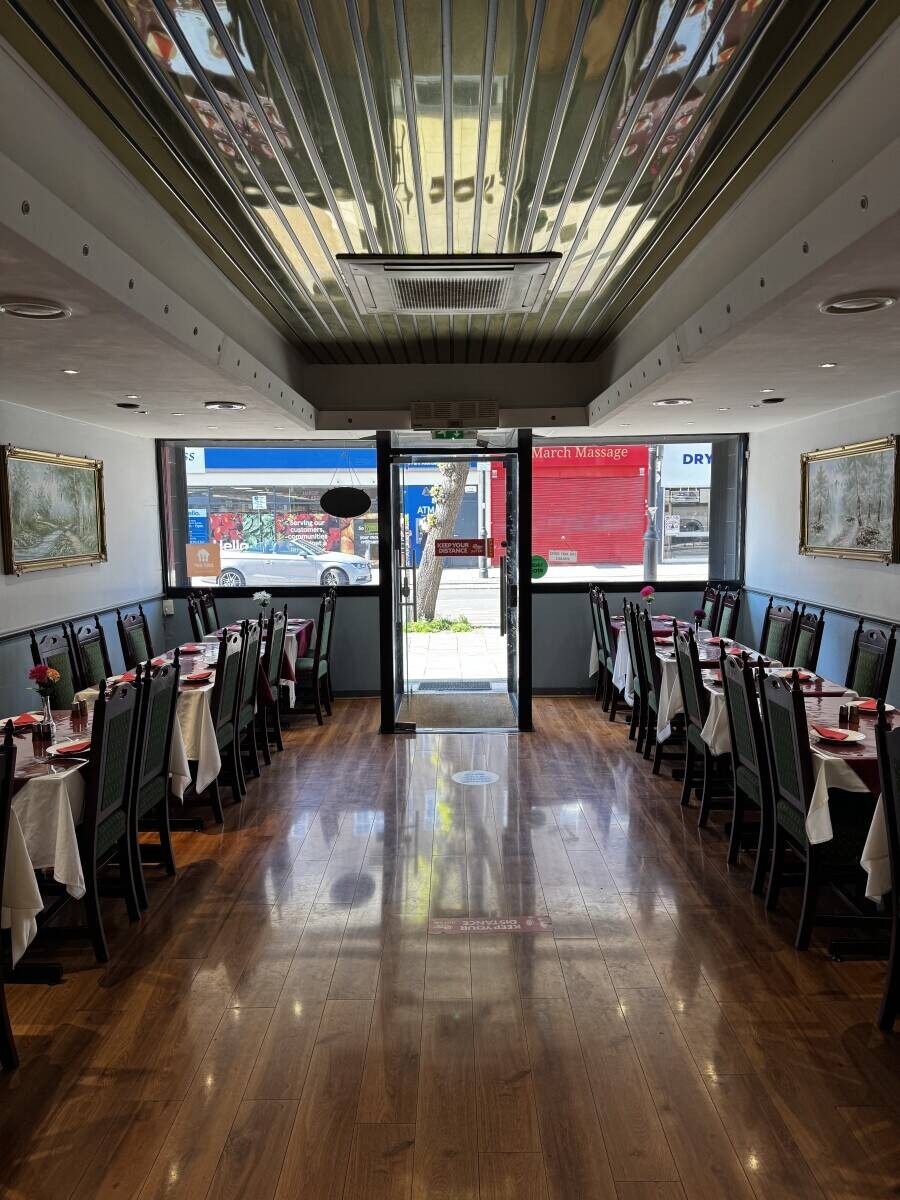 Indian restaurant with three 2-bedroom apartments in Elm Park