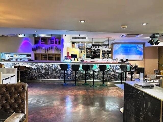 Well-established Air-conditioned Indian Restaurant for Sale Photo 2