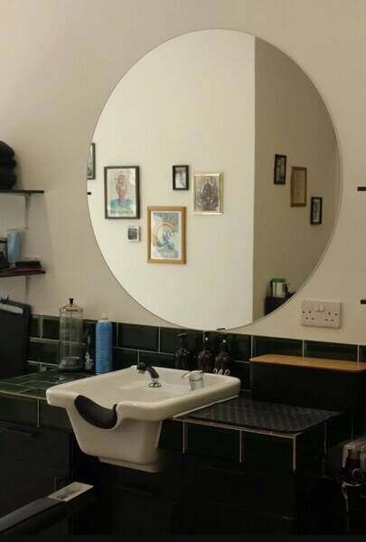 Popular Barber’s Shop on Busy Road in North London Photo 2