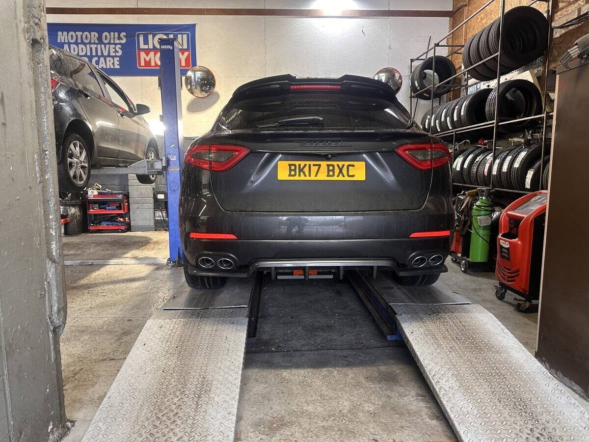 Fully equipped car repair garage with tyre fitting and motorcycle mot bay Photo 3