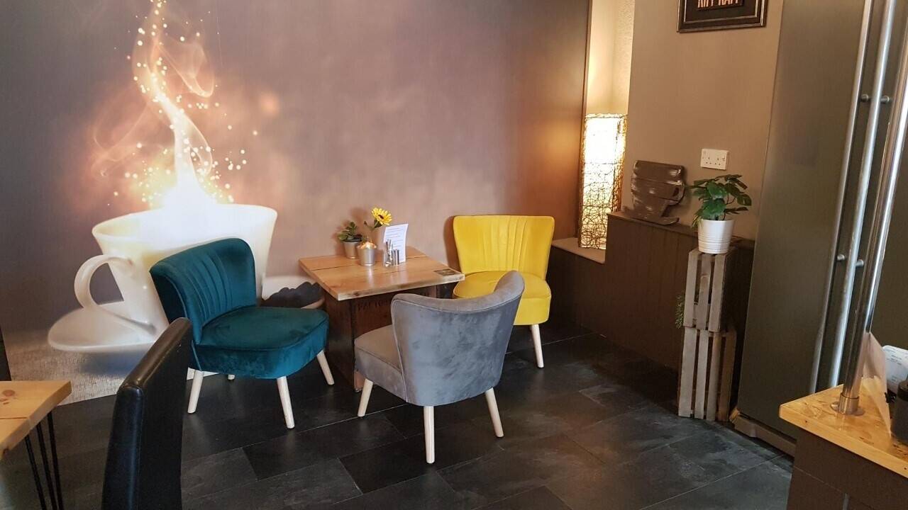 Newly created busy Coffee Shop, leasehold with additional income from established room rental.