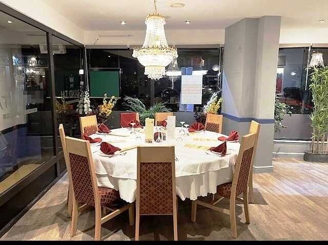 Well Presented Licensed Air - Conditioned Indian Restaurant for Sale Photo 3