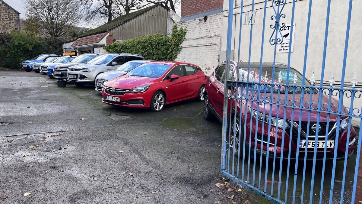 Established Car sales and repair dealership with flats.With planning permission to build on