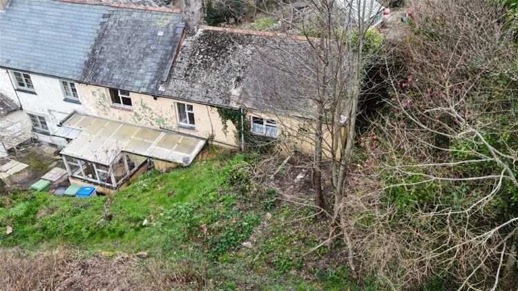 Auction Lot: Renovation-Ready 3-Bedroom Cottage plus Development Land For Sale in Newton Abbot