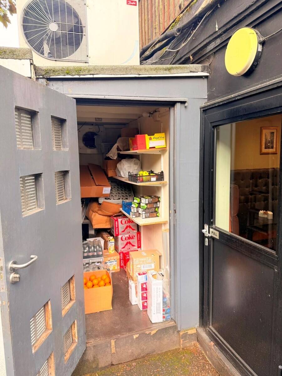 Premium café on Epping High Street that comes with 2 three bedroom flats with  'sitting tenants'
