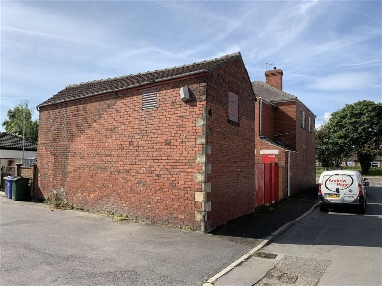 FREEHOLD MOTOR SPARES CENTRE WITH PRIVATE APARTMENTS IN DONCASTER SUBURB