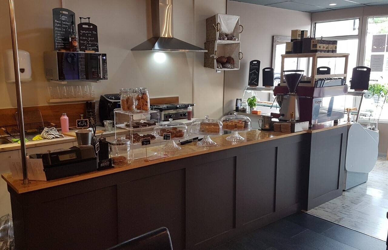 Newly created busy Coffee Shop, leasehold with additional income from established room rental. Photo 4