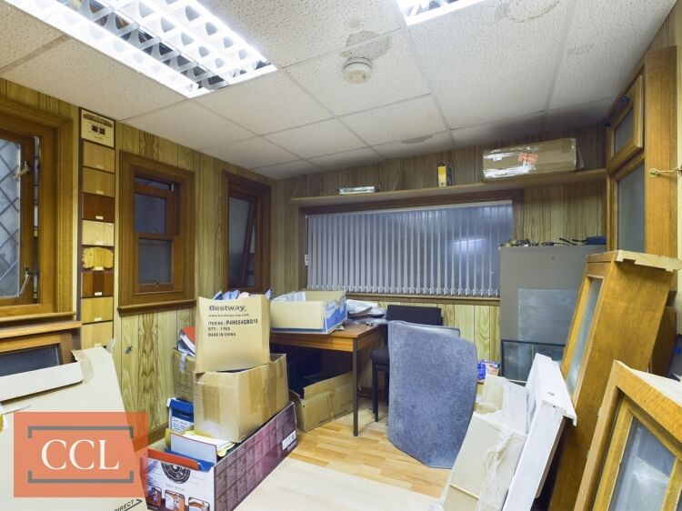 Significant commercial property with a secure yard Photo 4