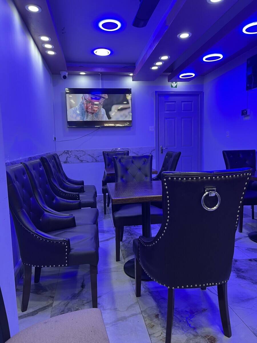 cafe and restaurant business in Moss Side, Manchester,