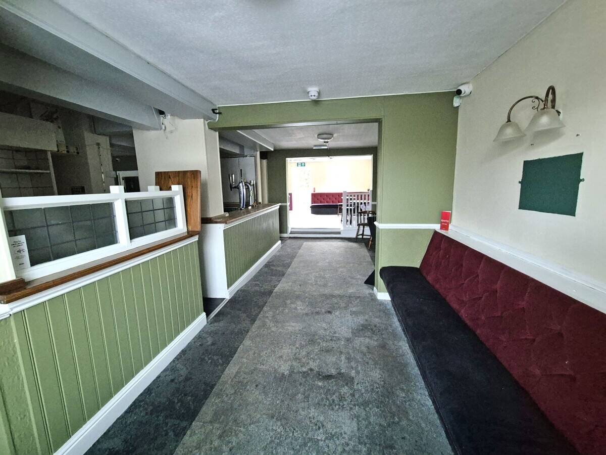 WREXHAM COUNTY BOROUGH - COMMUNITY PUBLIC HOUSE LOCATED ON BUSY MAIN ROAD