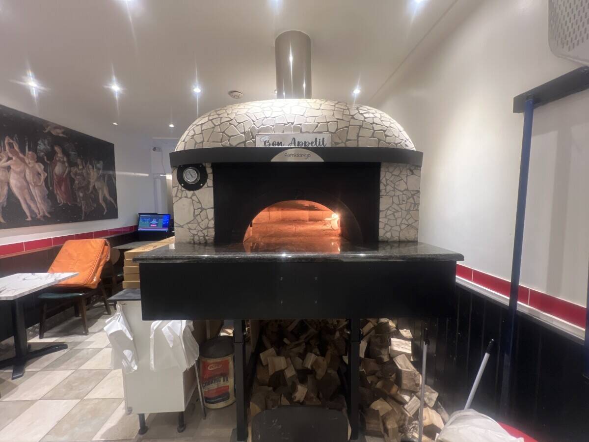 Italian pizza restaurant with wood-fired oven
