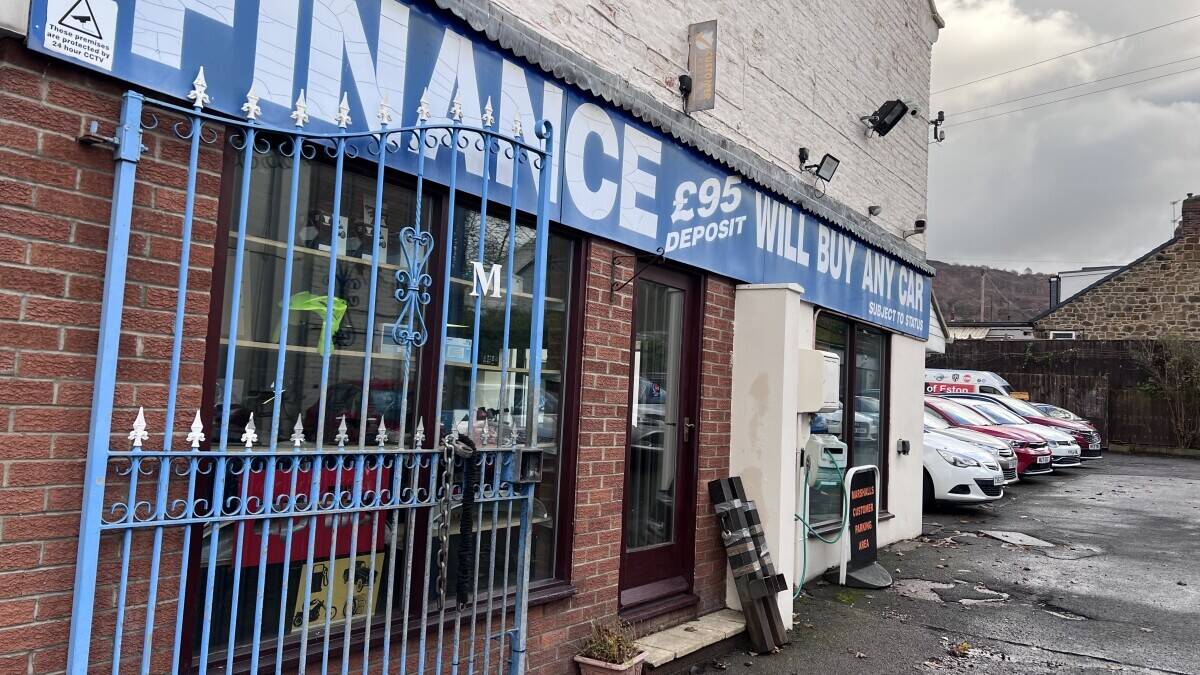 Established Car sales and repair dealership with flats.With planning permission to build on Photo 4