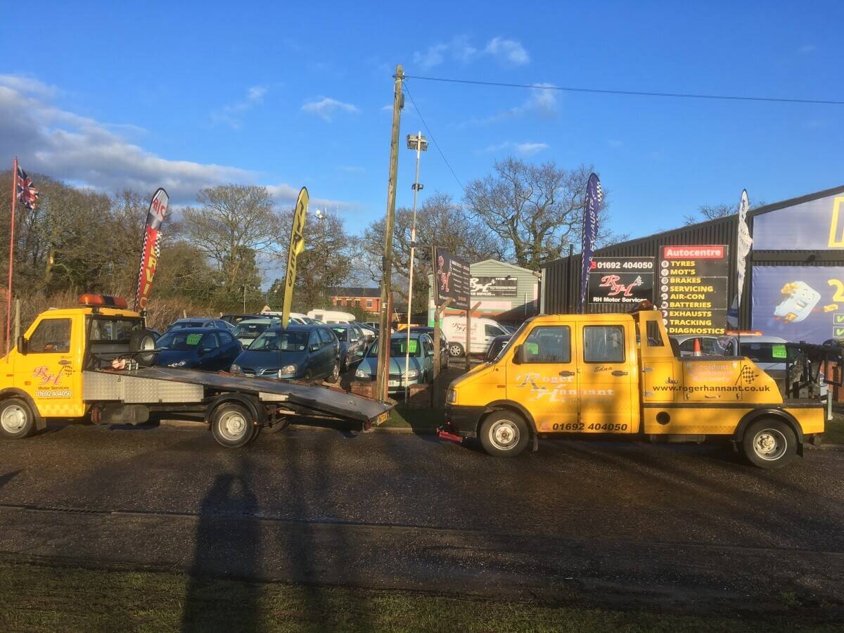 Garage Services MOT Station and Car sales in prominent main road location to large market town.Devel