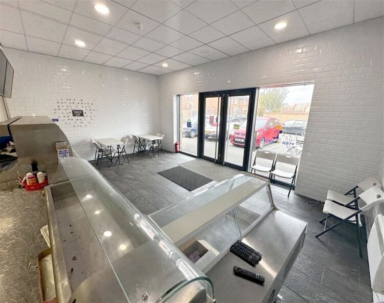 Modern fish & chip takeaway, end-of-parade Upton Photo 4