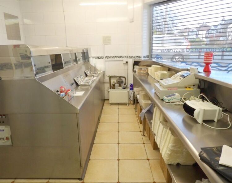 Staff-run fish & chip shop, affluent north Leeds suburb Photo 4