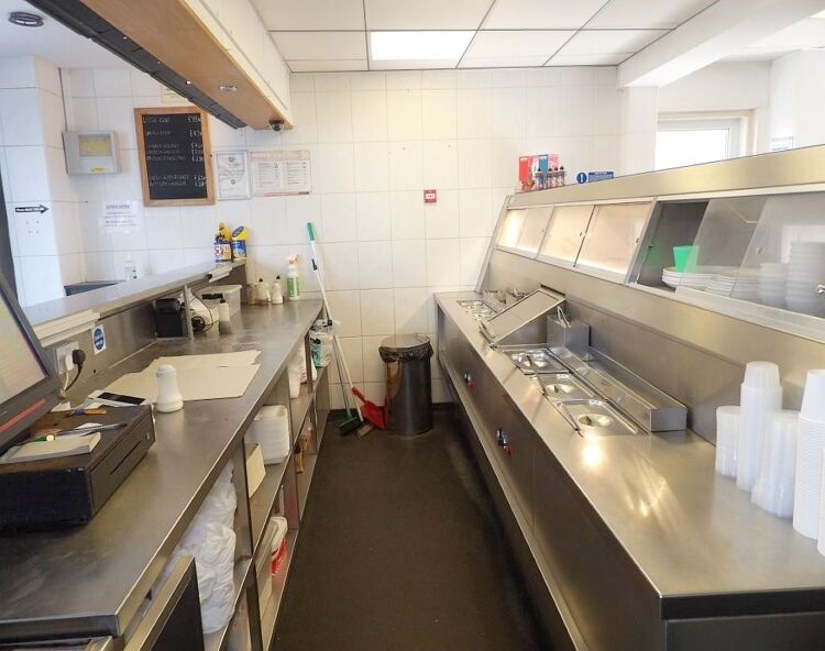 Semi-detached freehold fish & chip takeaway with unused 28 cover cafe, trading just 28 hours weekly