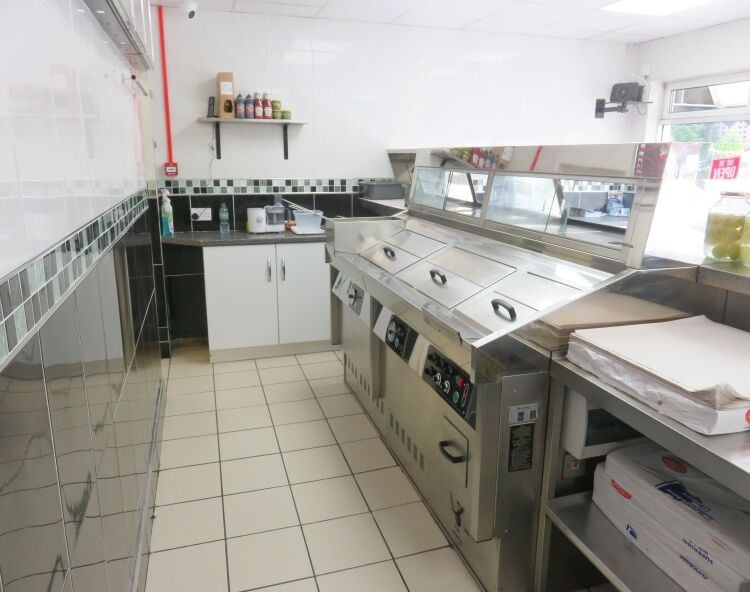 Freehold fish & chip takeaway with potential plus 2 bedroom flat, same ownership since 1983 Photo 4