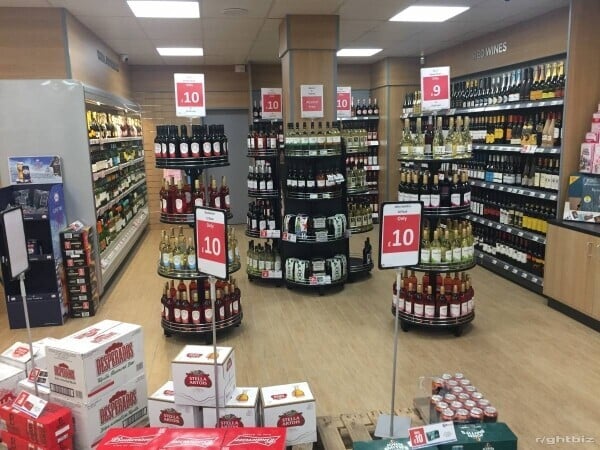 Long established thriving off licence and convenience store in a VERY busy shopping parade. Photo 2