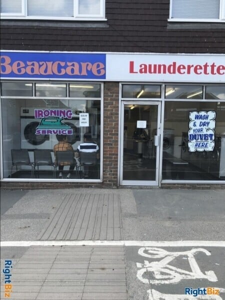 Busy launderette that offers ironing service good location with no local competition Photo 1