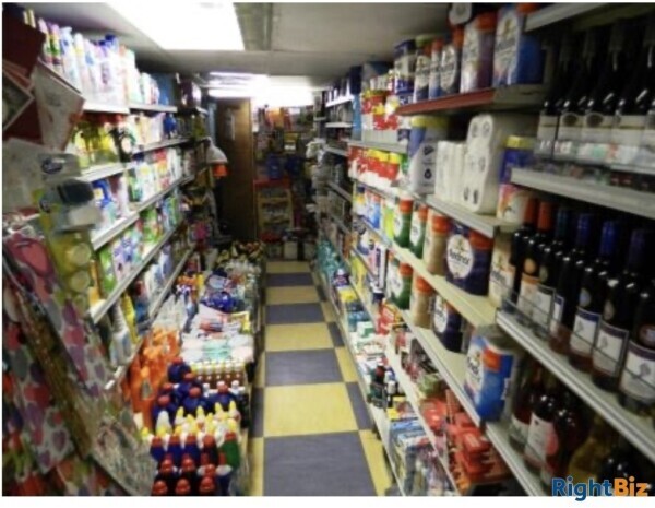 SUPERB CONVENIENCE STORE / OFF LICENCE / NEWSAGENTS WITH LARGE THREE BEDROOM FLAT NO COMPETITION Photo 2