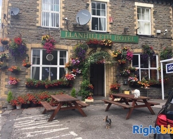 South Wales Free House with 4 Bar areas, 4 Good sized letting rooms and Owners apartment Photo 1