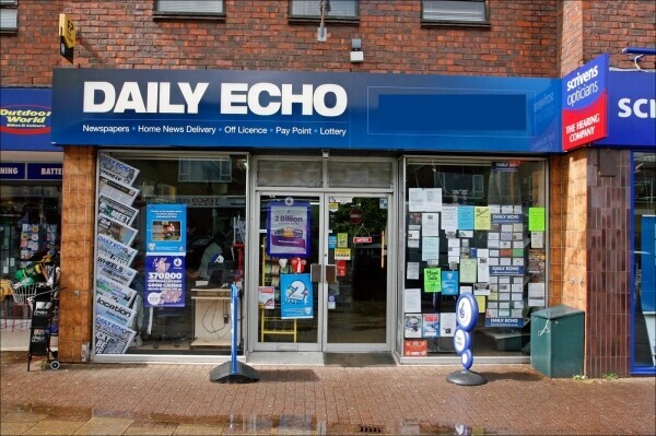 Newsagents with unexploited Off-Licence, amidst affluent residential suburb, outskirts of Poole. Photo 1