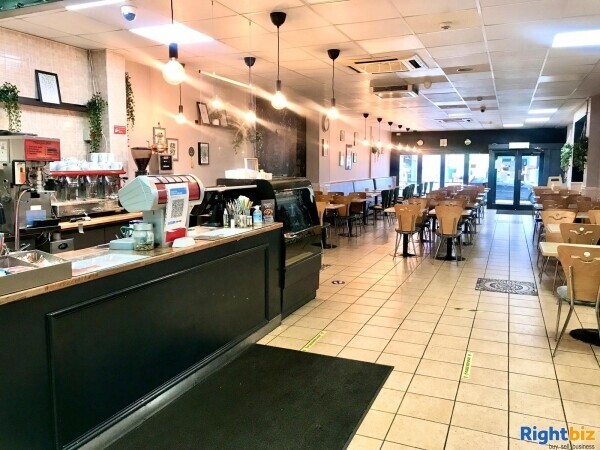 Busy Cafe/Restaurant for sale (120 seats), located on high street, with a large 2 bedroom flat Photo 1