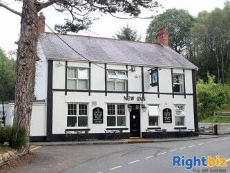 SWANSEA VALLEY - ATTRACTIVE COTTAGE STYLE PUB & RESTAURANT LET AS INVESTMENT PRODUCING YIELD OF 8.6%