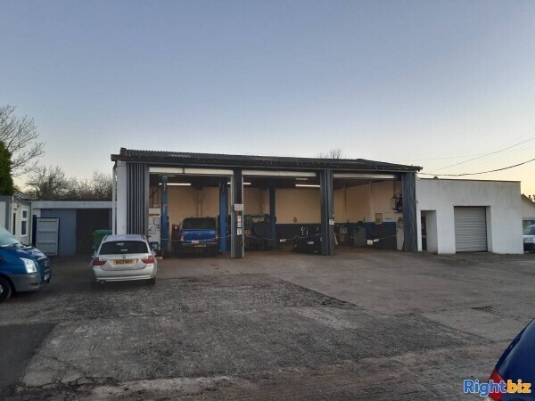 LONG-ESTABLISHED GARAGE Photo 1