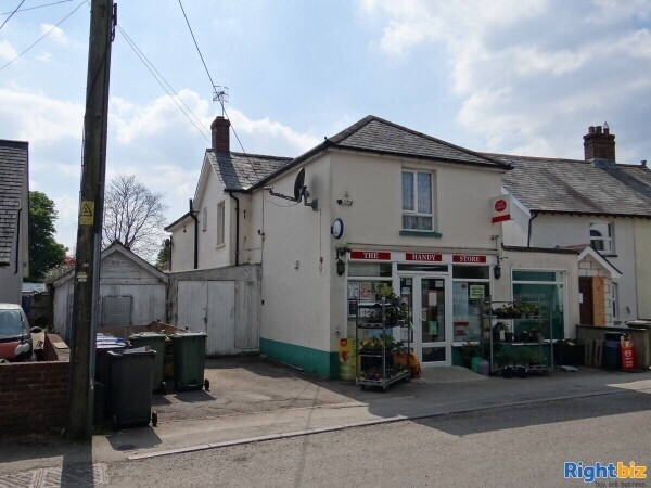 Busy Conv Store and PO Local with large Home Photo 1