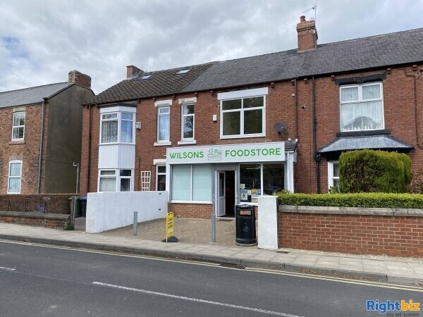 Freehold Convenience Store & Off Licence Store with 2 Bedroom Property Photo 1