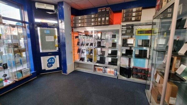 RETAILER OF ELECTRONIC DEVICES AND MONEY TRANSFER POINT Photo 1