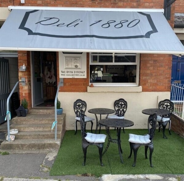 Well-Established, Profitable Family-Run Café in Heart of Affluent Village Photo 1