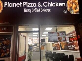 Very busy Pizza and chicken shop on High street with living accom.