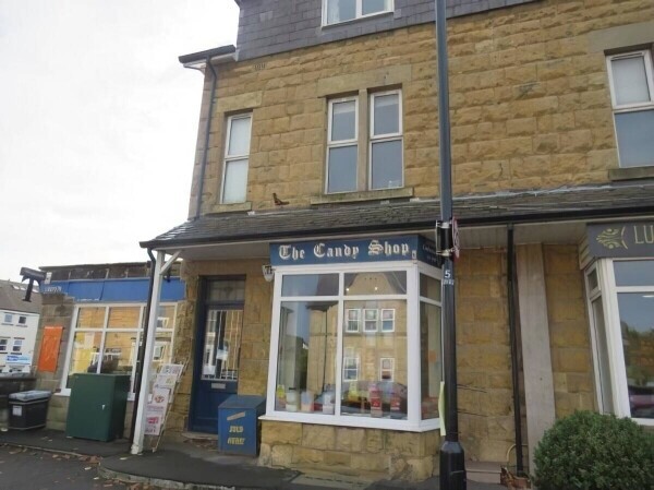 Old-Established Newsagents and Sweet Shop Photo 1