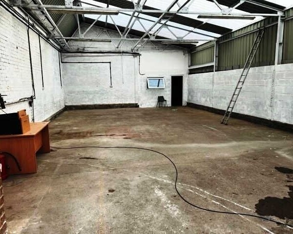 E Class Premises former Tyre Fitting Business With Specific Consent For Convenience Store no Local Competition for Sale Photo 1