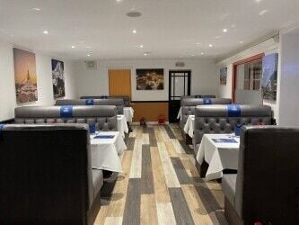 A leasehold Indian restaurant with sports bar on the basement and a party hall on first floor A leasehold Indian restaurant with sports bar on the basement and a party hall on first floor