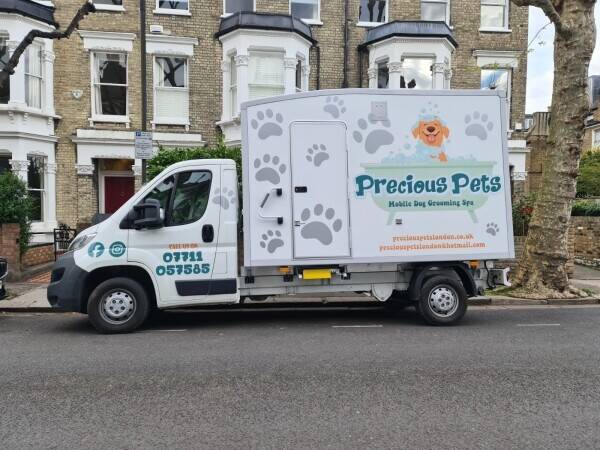 Mobile grooming van is for sale.