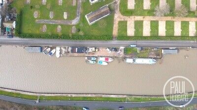 Unique riverside plot with 23 moorings on the Norfolk Broads. Photo 1