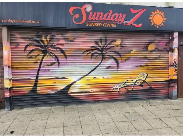 Well established tanning salon for sale Photo 1