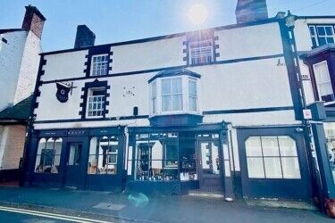 TWO RETAIL UNITS WITH EIGHT GUEST BEDROOMS FOR SALE, LLANGOLLEN, NORTH WALES. Photo 1
