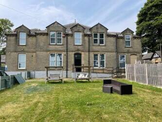 FORMER 15 BED BUPA CARE HOME Photo 1