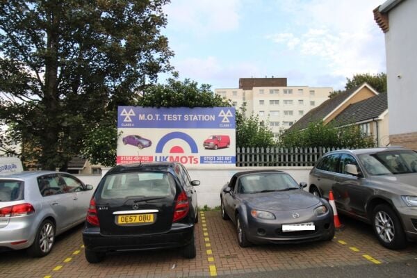 London Properties are pleased to the market this very well-established one-man Class 4 -7 MOT center located in Flowers Industrial Estate is accessed  Photo 1