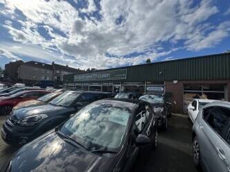 Car showroom with forecourt for c.35 vehicles located just 15 minutes west of Edinburgh city centre.