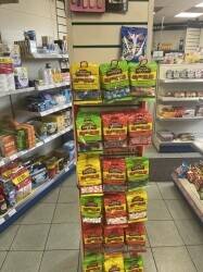 Off license shop on a busy road Photo 1