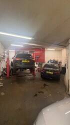 Busy car mechanic garage in east Belfast main street Photo 2