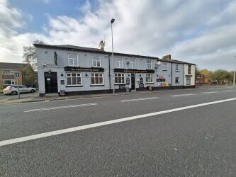 GREATER MANCHESTER - WET-LED COMMUNITY PUB WITH NINE LETTING ROOMS